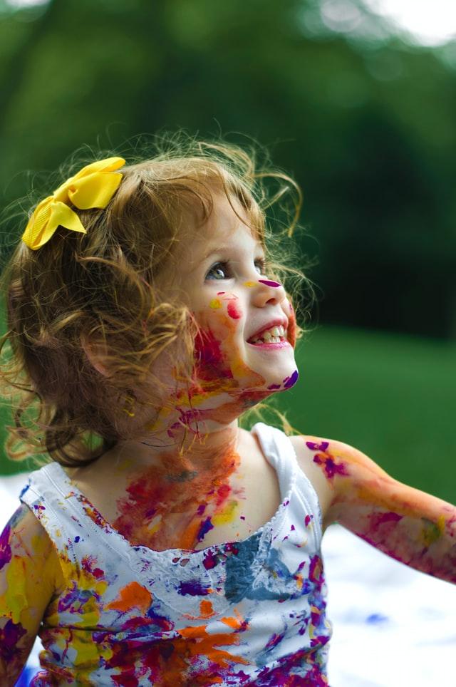 Child engaging in fun therapy activity