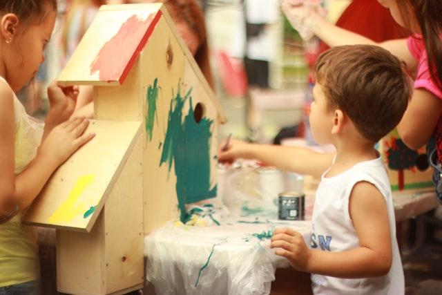 Child exploring tactile materials