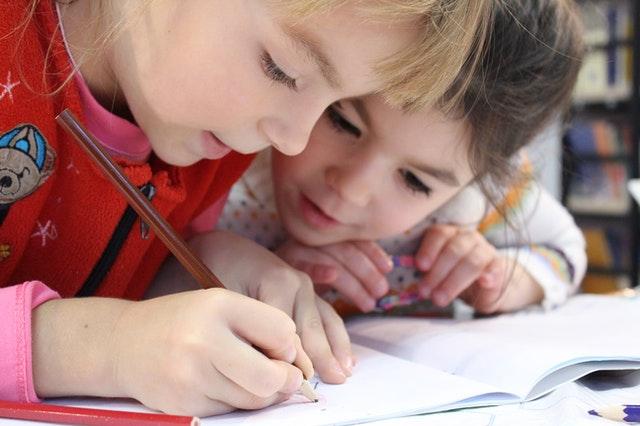 Child practising fine motor skills